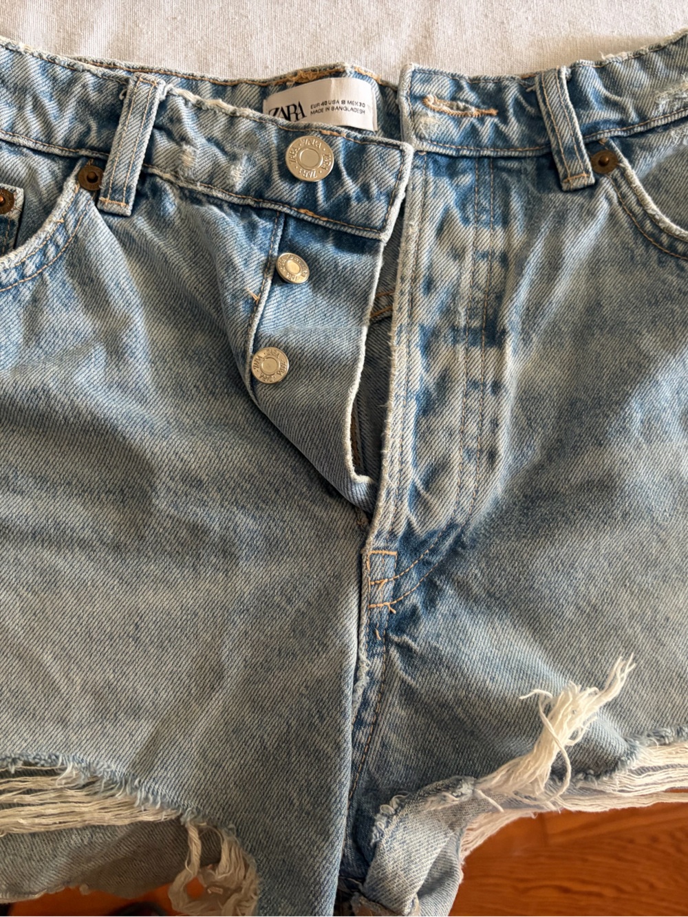 Zara Light Wash Distressed Denim Cutoff Shorts